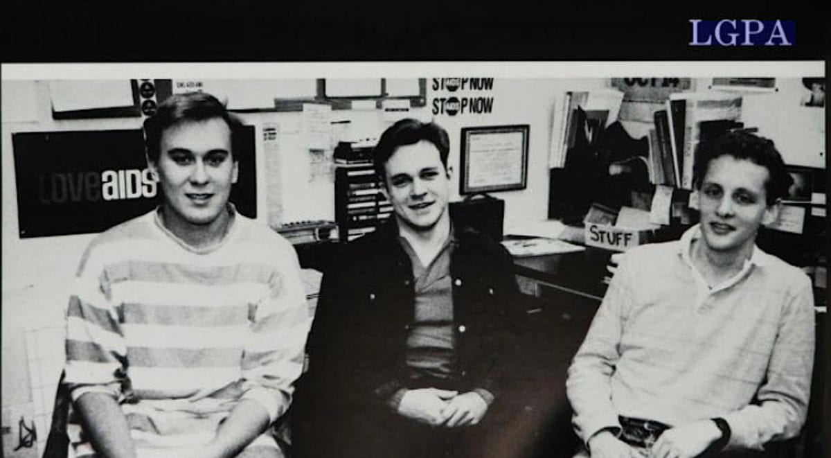 A black and white photograph of three GW student members of the Lesbian and Gay People’s Association in the 1989 Cherry Tree Yearbook.